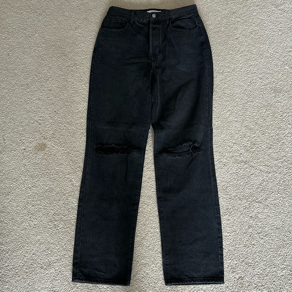Black PacSun jeans with rip in the knee